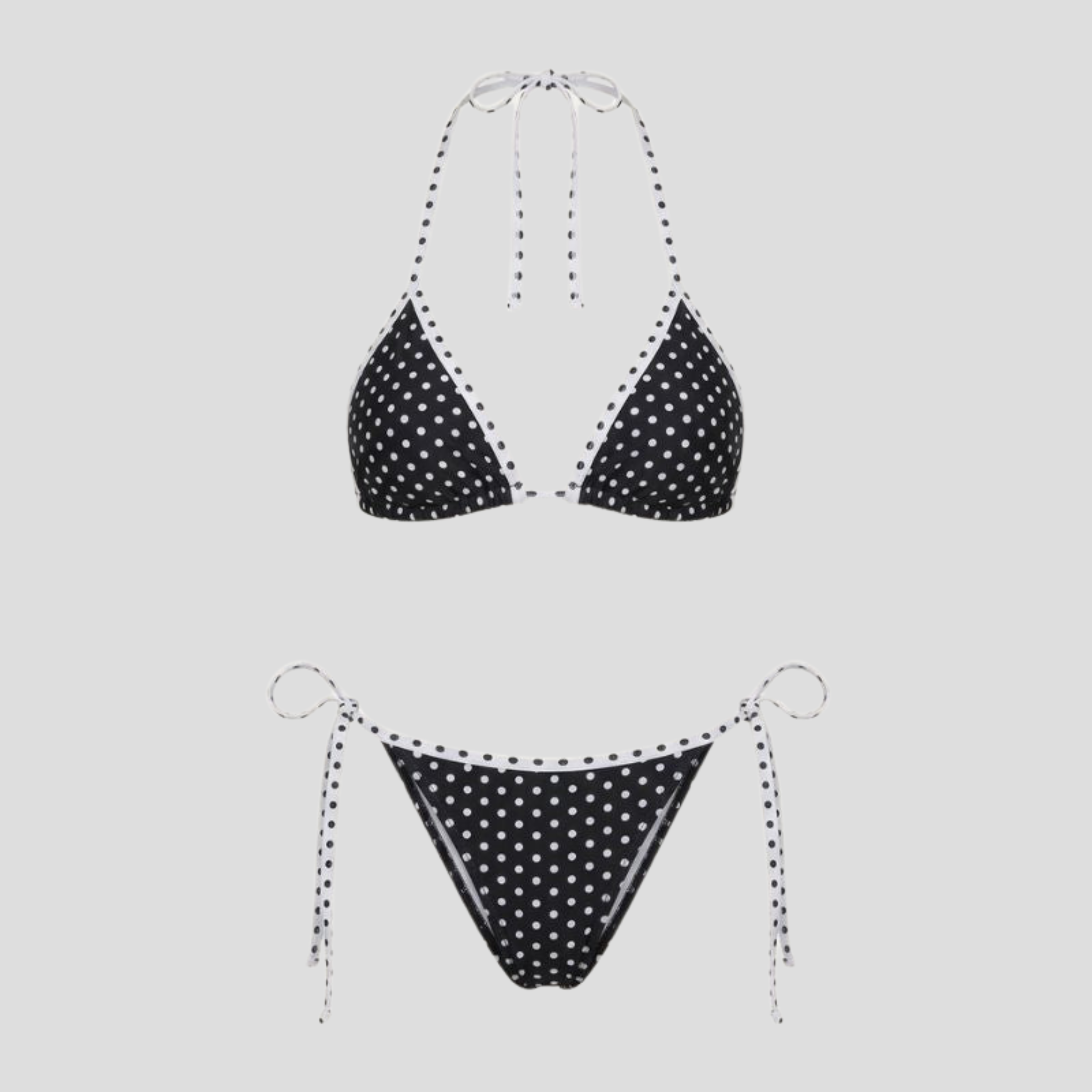 Black polka-dot triangle bikini set with adjustable ties and contrast trim detailing