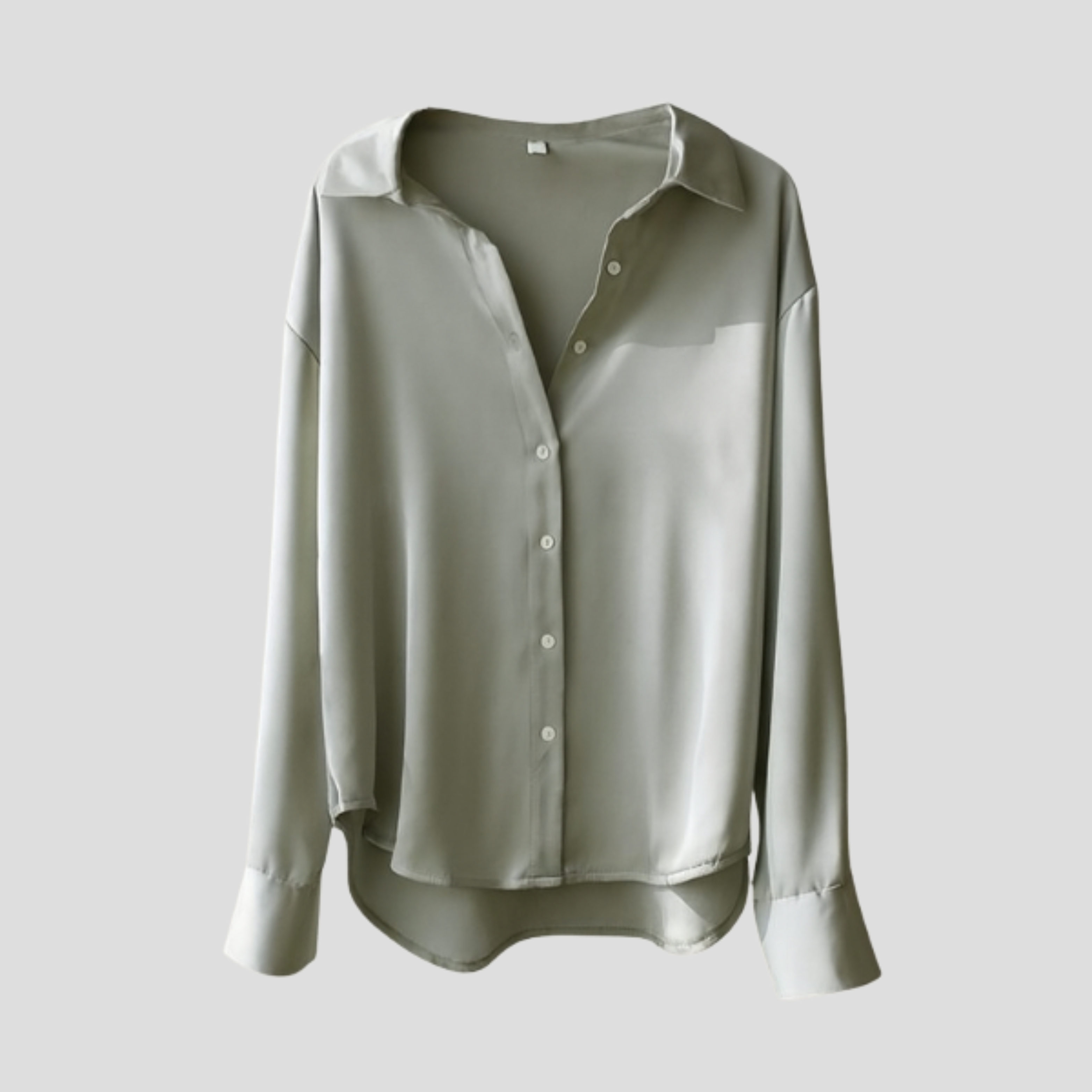 Women's draped relaxed-fit blouse with soft flowing lines, shown in a neutral color