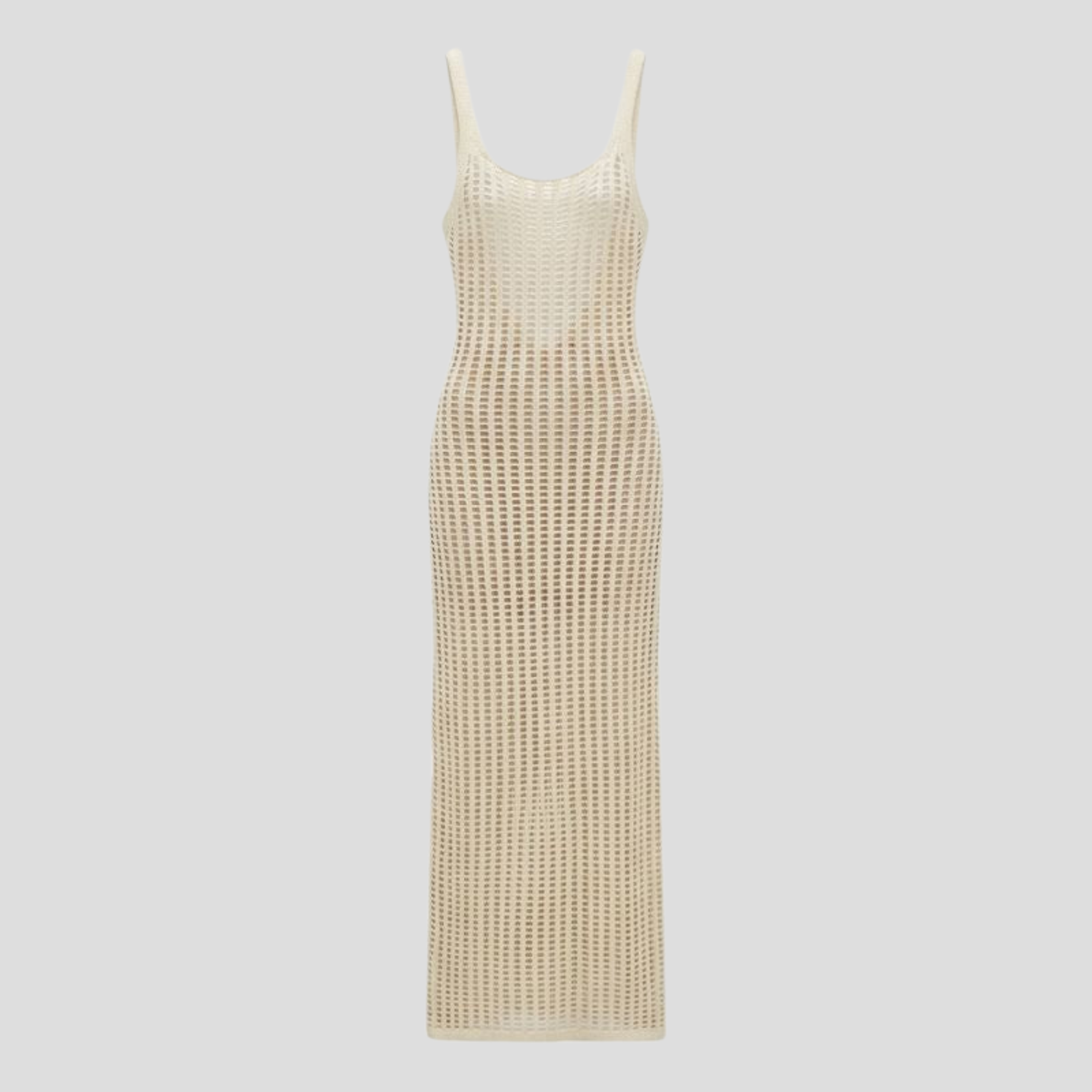 White backless maxi dress with open pattern and elongated floor-length silhouette