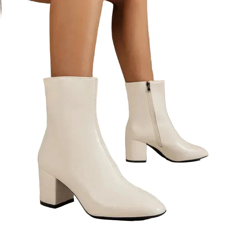 Women's faux leather block heel ankle boots with side zipper in white, black and beige